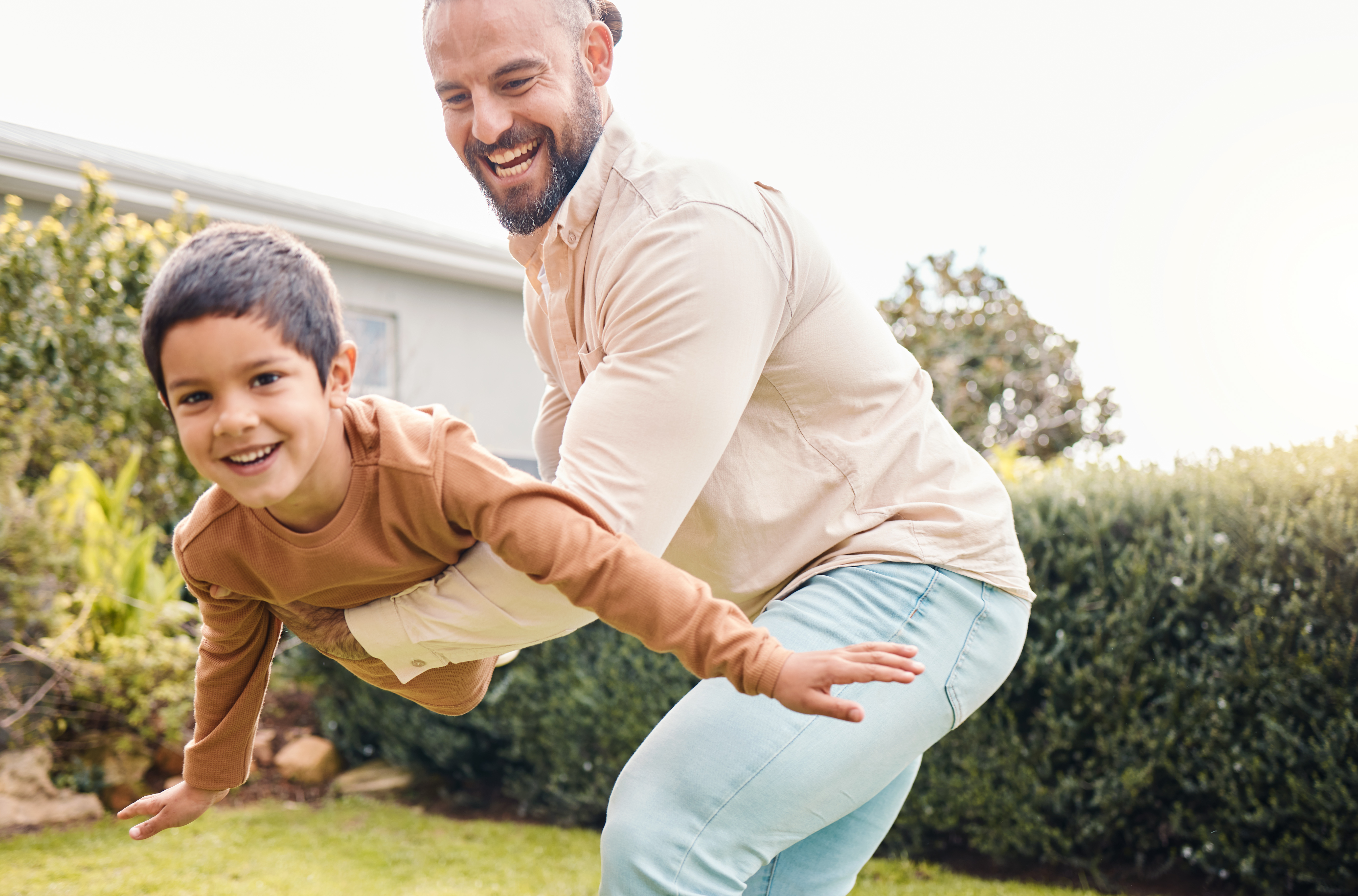 Dad and son playing